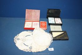 A small quantity of miscellanea including lace doilies,