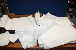 A quantity of white linen including damask, lace edged, drawn edge etc.