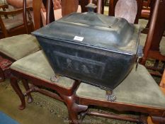 A Toleware Log box complete with lid and having lion-mask drop-ring carrying handles to either end,