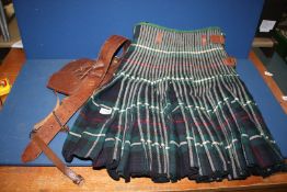 A Paisley's Ltd Kilt in Mackenzie tartan with leather sporran and belt.