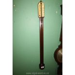 A Stick Barometer by O. Comitti & Son, London, 36 1/2'' long.