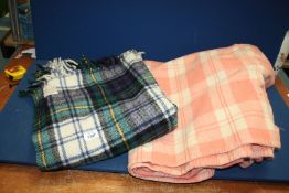 Two blankets including one double in pink and white and a Dormy Berkley car Rug in blue and green