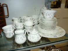 A Wedgwood ' April Flowers' coffee and tea set for six (teapot absent).