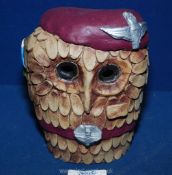 A novelty sculpture of an Owl made from clay with The Parachute Regiment beret,