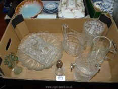 A quantity of cut glass including lidded pot, ice bucket with metal handles, jug,