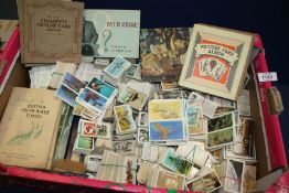 A good quantity of Cigarette and Tea Cards including Players, Wills etc.