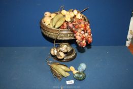 A quantity of stone fruit including bunches of Agate grapes, bananas, marble egg, fruit bowl stand,