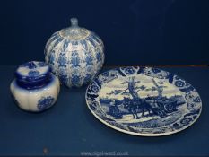 Three pieces of blue and white china including a Delft Blauw Chemkefa charger (15 1/4'' diameter),