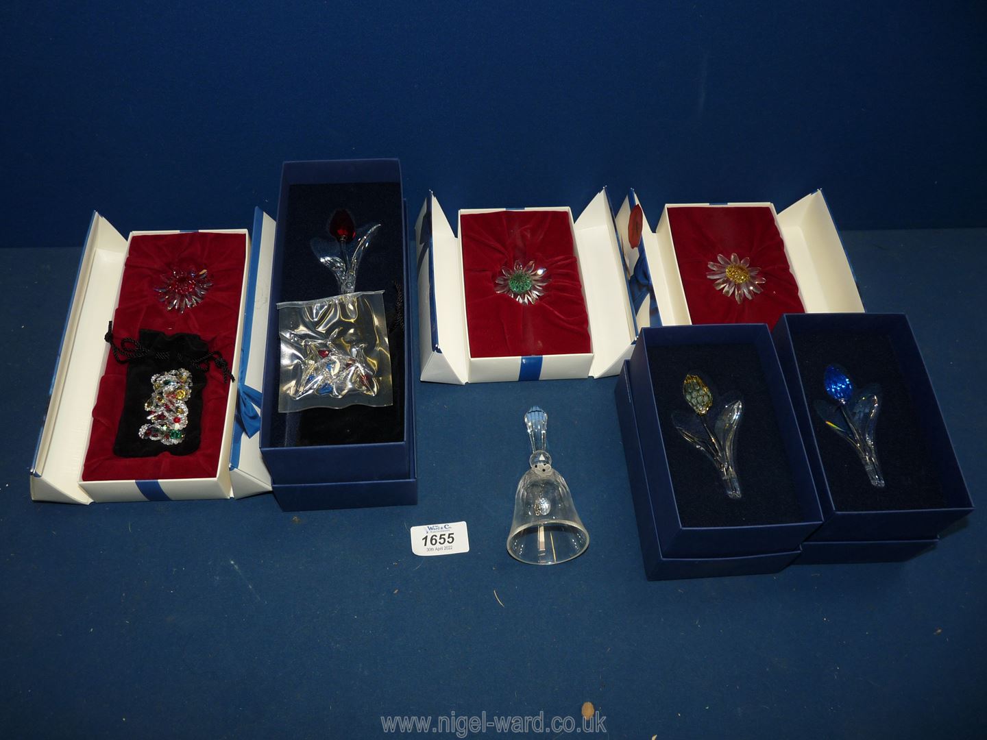 A quantity of boxed Swarovski Crystal including Tulips and bell etc.