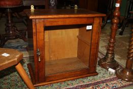 An wall mounted display Cabinet, with glass door and shelf, 18" x 12 1/2" x 19 1/2".