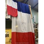 A large Tricolore flag (15' x 7'6'') by Ernest W.