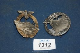 A German E-Boat Badge and a WWII German Blockade Badge.