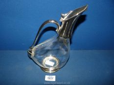 A Claret Jug with white metal spout and handle, 10'' tall.