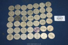 A quantity of Queen Elizabeth shilling pieces, etc. (approx. 42 in total).