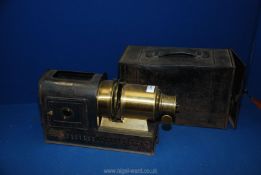 A heavy iron cased triple wick Magic Lantern of good quality with brass fittings and blue side