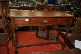 An Edwardian Oak side Table having Arts and Crafts details,