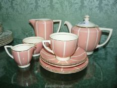 A Minton part Tea for Two set ''Solono ware'', pink ground with cream stripes,