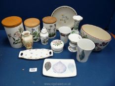 A quantity of Portmeirion china including graduated set of canisters, 'Dusk' beaker and platter,