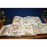 A quantity of miscellaneous stamp books, partly filled with various country stamps including Japan,