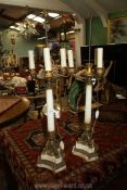 A pair of excellent quality white marble and ormolu triple light Table Lamps,