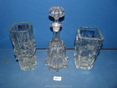 Two heavy clear glass Studio vases, 8 1/4'' and 9 3/4'' tall and a decanter, 12 1/2'' tall.