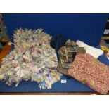 A quantity of textiles including small rag rug, 'Poetry' linen top, scarves, etc.