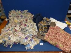 A quantity of textiles including small rag rug, 'Poetry' linen top, scarves, etc.