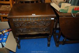 A dark wood Priory style hall table with two drawers,