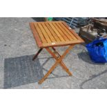 A wooden folding table.