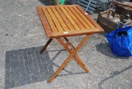 A wooden folding table.