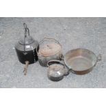 A copper pan, Range kettle, Range tea urn and oval cook pot.