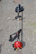 A Robin NB2100 petrol strimmer, (good compression).