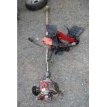 A Mountfield strimmer with harness.