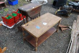 A drop-leaf table on turned legs, 23'' x 14'' x 28'' high and a coffee table with lower shelf,