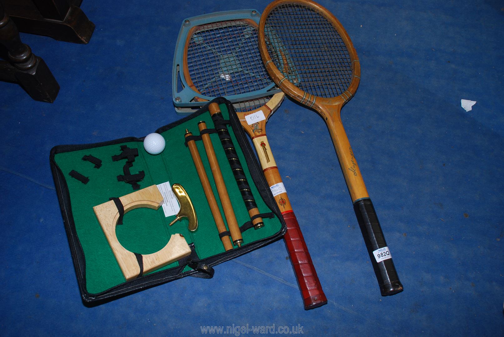 Two old Slazenger racquets one with Slazenger press and a three piece putter