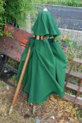 A green garden parasol.