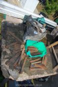 A quantity of cold chisels and punches, galvanised bucket of nuts, bolts, stable, Spong mincer, etc.