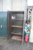 A metal stationary cupboard with three shelves, 6' high x 36" high x 18" deep.