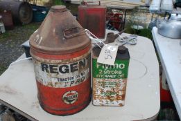 An empty 'Flymo' gallon can and a 'Regent Oil can.
