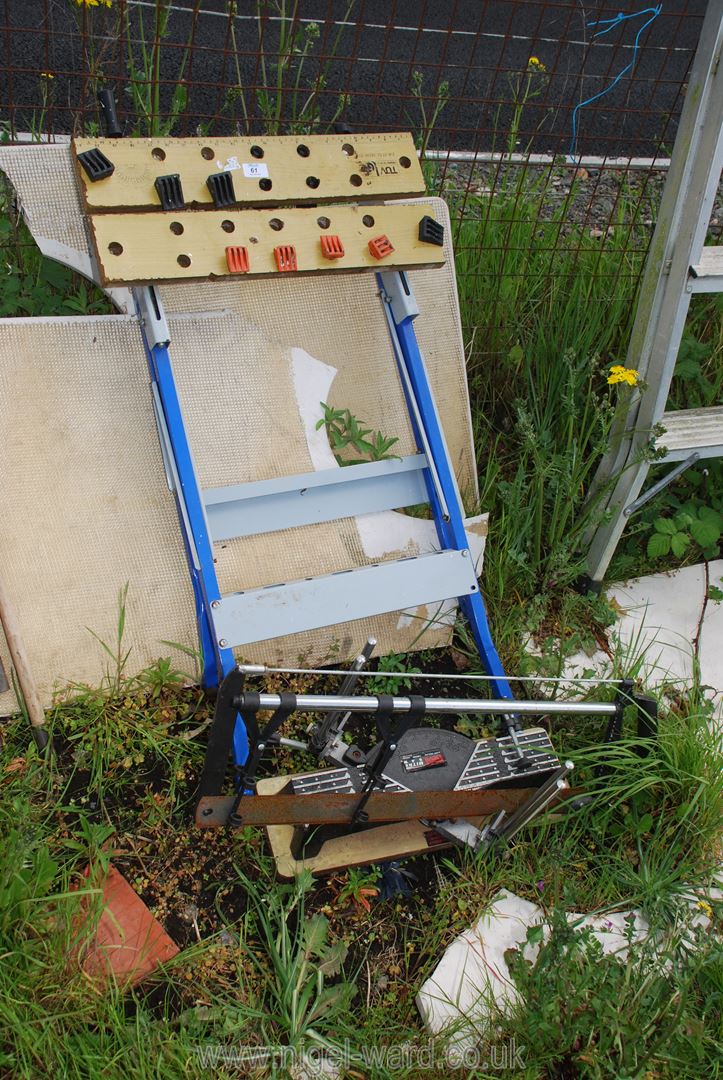 A Workmate and a Power Devil mitre saw.