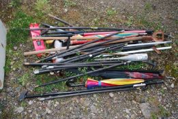 A quantity of nylon drain rods, ground spike, brushes, etc.