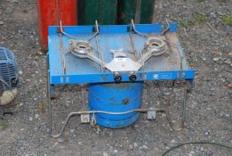 A twin camping stove and cylinder.