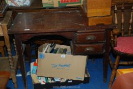 A small darkwood office desk with two side drawers, a/f.