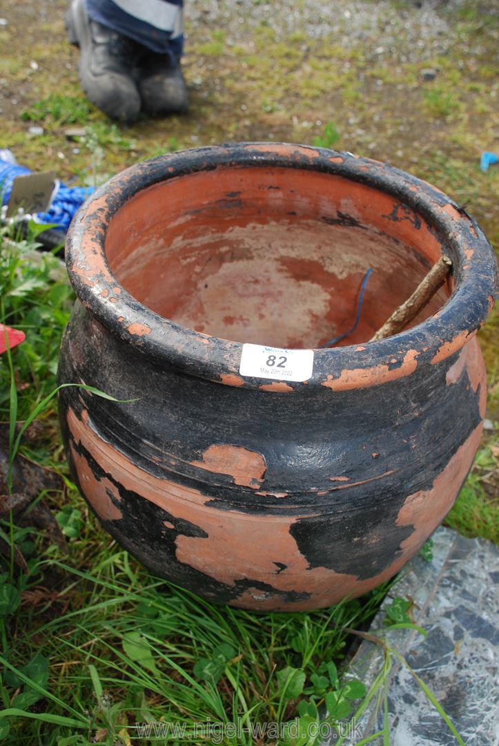 A painted terracotta planter.
