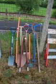 Gardening tools including rake, spade, shovel, etc. (8 in total).