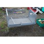 A galvanised Chicken Coop with feeders, 38'' x 20'' x 26'' high with removable dump tray.