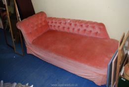 A salmon pink Chaise longue
