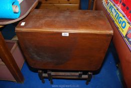 A small drop leaf gateleg table