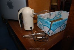 A Dualit Electric Hand Mixer having built in cable tidy,