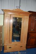 A stripped Pine wardrobe with mirrored door and lower drawer 48" x 21" x 77" tall.